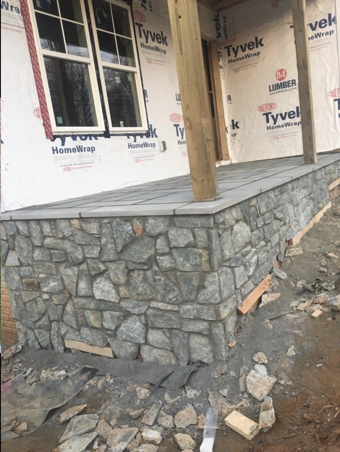 Stone porch masonry during construction